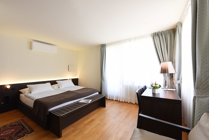 Imagen de la habitación del Hotel Walter Au Lac. Foto 16