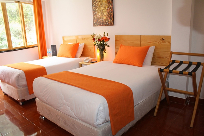 Imagen de la habitación del Hotel Waman. Foto 11
