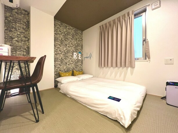 Imagen de la habitación del Hotel Wan Osaka ebisu. Foto 12