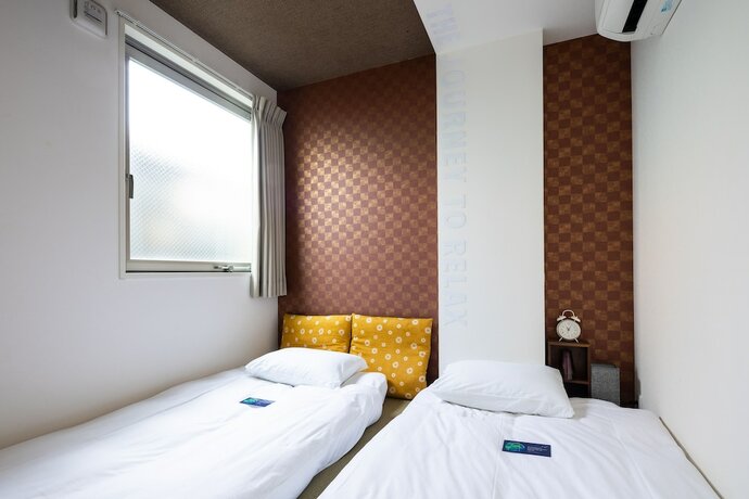 Imagen de la habitación del Hotel Wan Osaka ebisu. Foto 19
