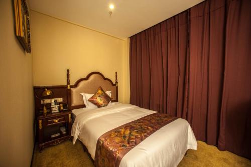 Imagen de la habitación del Hotel Wan Sheng International. Foto 6