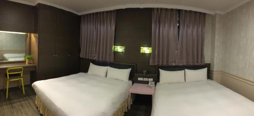 Imagen de la habitación del Hotel Wan Tai. Foto 9
