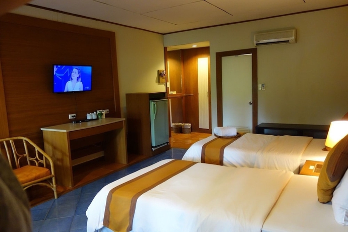 Imagen de la habitación del Hotel Wanathara Resort. Foto 9