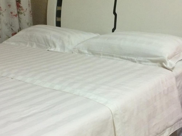 Imagen de la habitación del Hotel Wanda Gold Dragon Holiday Apartment. Foto 4
