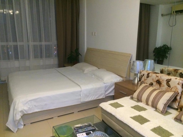 Imagen de la habitación del Hotel Wanda Gold Dragon Holiday Apartment. Foto 5