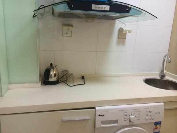 Imagen de la habitación del Hotel Wanda Gold Dragon Holiday Apartment. Foto 9