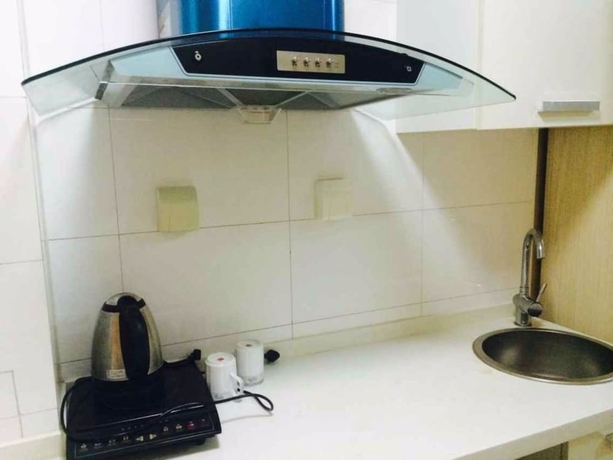 Imagen de la habitación del Hotel Wanda Gold Dragon Holiday Apartment. Foto 10