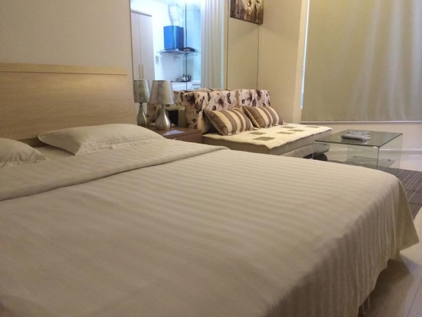 Imagen de la habitación del Hotel Wanda Gold Dragon Holiday Apartment. Foto 16
