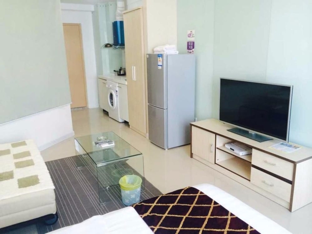 Imagen de la habitación del Hotel Wanda Gold Dragon Holiday Apartment. Foto 17
