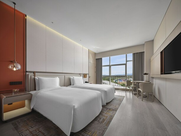 Imagen de la habitación del Hotel Wanda Jin Beijing Pinggu. Foto 13