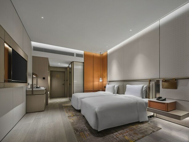 Imagen de la habitación del Hotel Wanda Jin Beijing Pinggu. Foto 23
