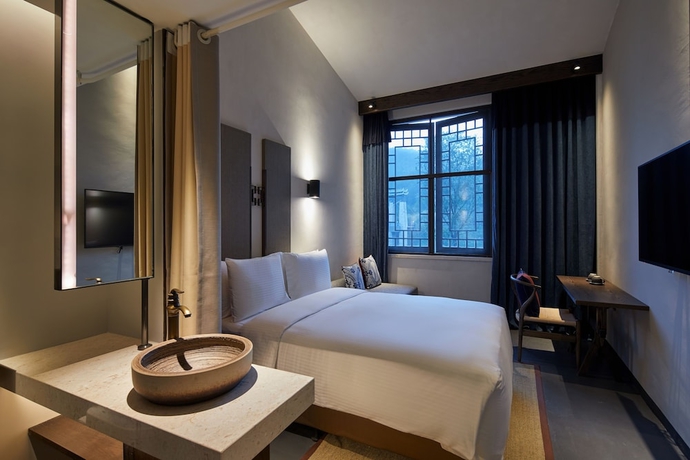 Imagen de la habitación del Hotel Wanda Jin Danzhai. Foto 6