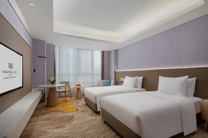 Imagen de la habitación del Hotel Wanda Jin Jiamusi. Foto 12