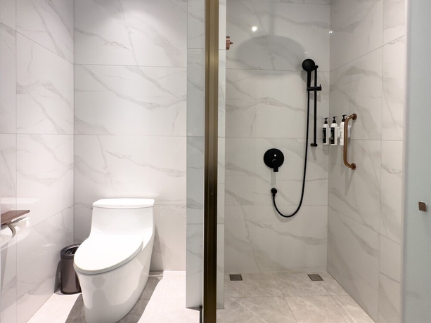 Imagen de la habitación del Hotel Wanda Jin Jiamusi. Foto 16