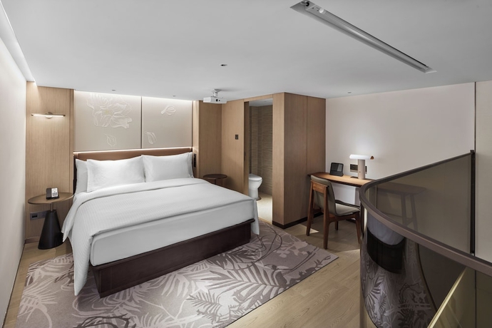Imagen de la habitación del Hotel Wanda Jin Ordos. Foto 11