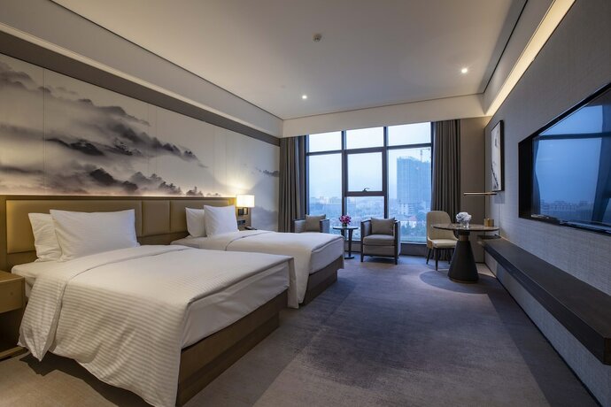 Imagen de la habitación del Hotel Wanda Jin Pingxiang. Foto 16