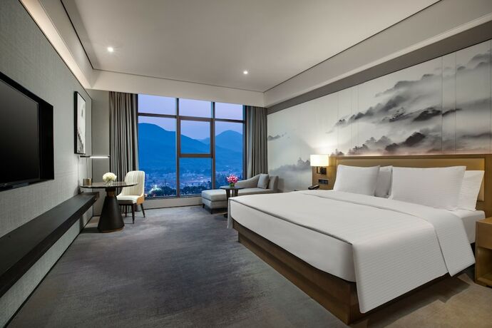 Imagen de la habitación del Hotel Wanda Jin Pingxiang. Foto 18