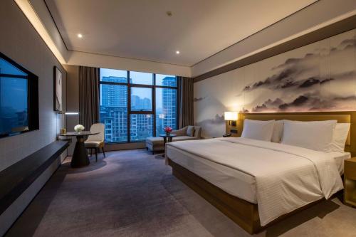 Imagen de la habitación del Hotel Wanda Jin Pingxiang, Luxi. Foto 11