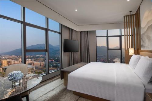 Imagen de la habitación del Hotel Wanda Jin Pingxiang, Luxi. Foto 15