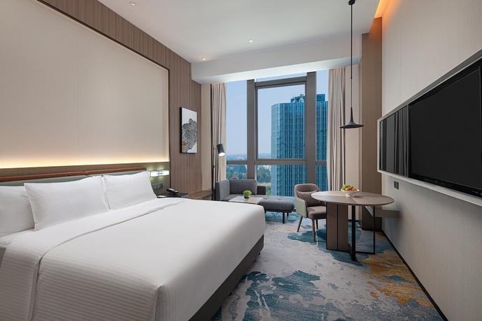 Imagen de la habitación del Hotel Wanda Jin Xiangjiang Dingzhou. Foto 3