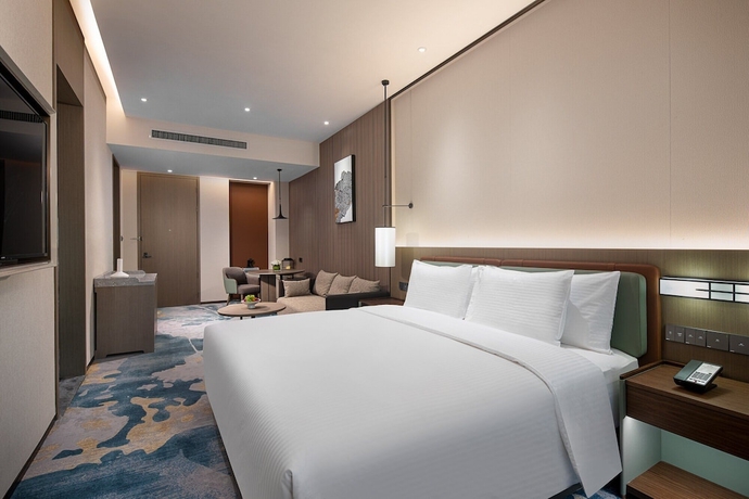 Imagen de la habitación del Hotel Wanda Jin Xiangjiang Dingzhou. Foto 7
