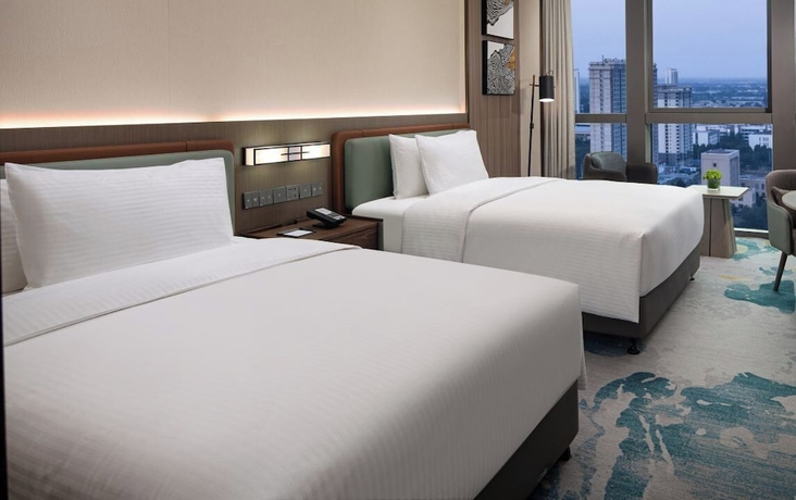 Imagen de la habitación del Hotel Wanda Jin Xiangjiang Dingzhou. Foto 9