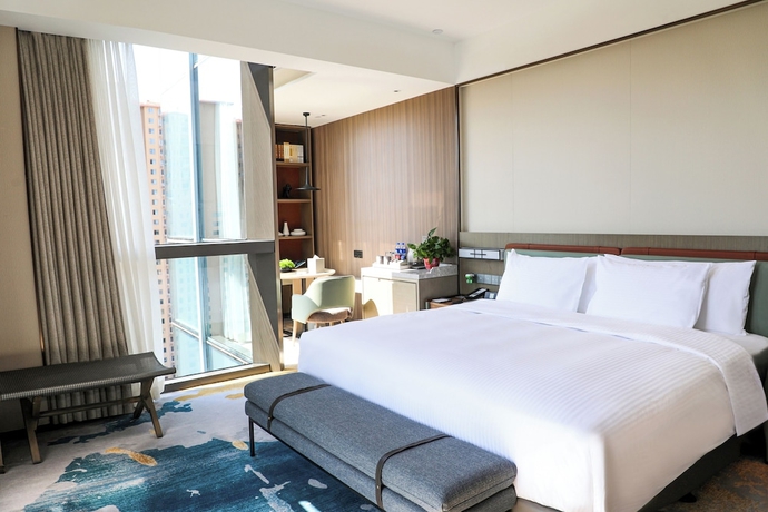 Imagen de la habitación del Hotel Wanda Jin Xiangjiang Dingzhou. Foto 10