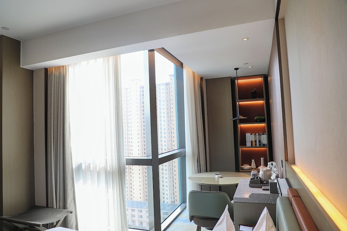 Imagen de la habitación del Hotel Wanda Jin Xiangjiang Dingzhou. Foto 11