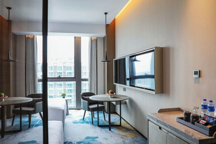 Imagen de la habitación del Hotel Wanda Jin Xiangjiang Dingzhou. Foto 13