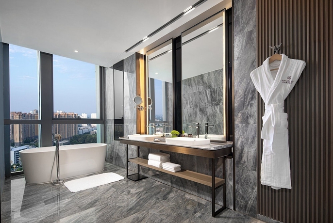 Imagen de la habitación del Hotel Wanda Jin Xiangjiang Dingzhou. Foto 14