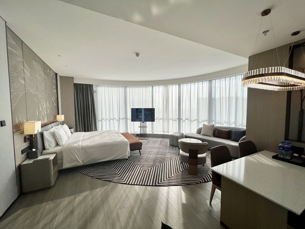 Imagen de la habitación del Hotel Wanda Jin Xiaohe Xincheng. Foto 4
