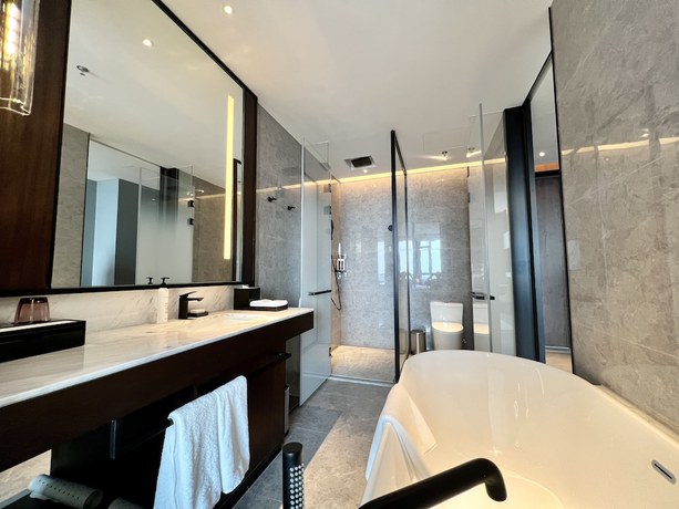 Imagen de la habitación del Hotel Wanda Jin Xiaohe Xincheng. Foto 11