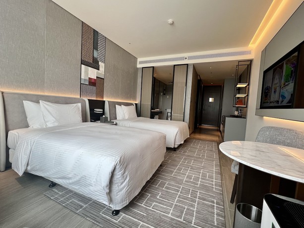 Imagen de la habitación del Hotel Wanda Jin Xiaohe Xincheng. Foto 14