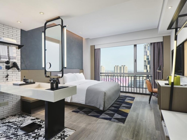 Imagen de la habitación del Hotel Wanda Moments. Foto 7