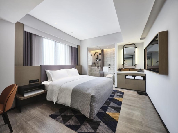 Imagen de la habitación del Hotel Wanda Moments. Foto 9