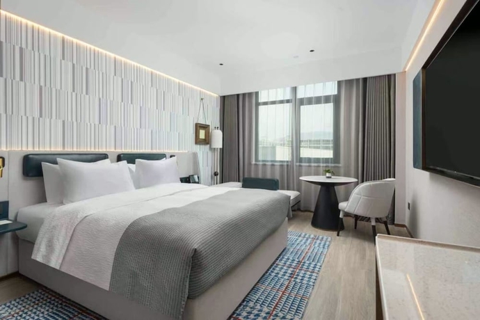 Imagen de la habitación del Hotel Wanda Moments Luoyang. Foto 8