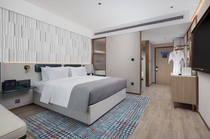 Imagen de la habitación del Hotel Wanda Moments Luoyang. Foto 9