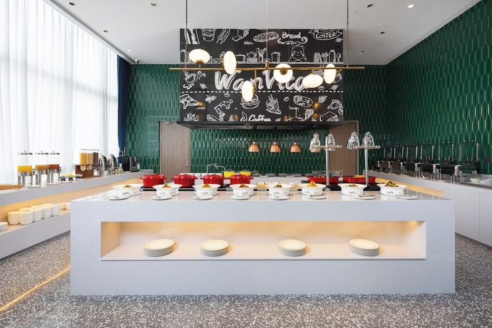 Imagen del bar/restaurante del Hotel Wanda Moments Luoyang. Foto 4