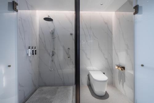 Imagen de la habitación del Hotel Wanda Moments Nanchang Xihu. Foto 19