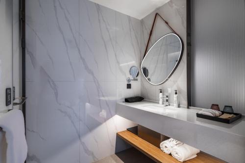 Imagen de la habitación del Hotel Wanda Moments Nanchang Xihu. Foto 20