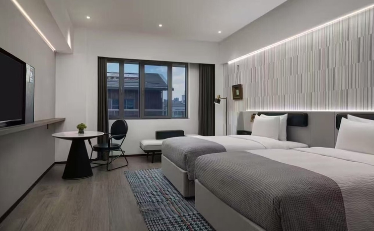 Imagen de la habitación del Hotel Wanda Moments - Suzhou Kejicheng. Foto 7