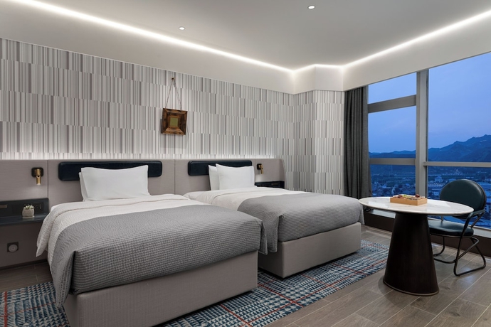 Imagen de la habitación del Hotel Wanda Moments Zibo. Foto 5