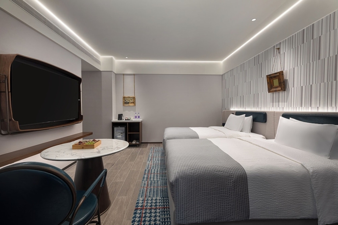 Imagen de la habitación del Hotel Wanda Moments Zibo. Foto 6