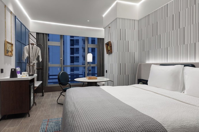Imagen de la habitación del Hotel Wanda Moments Zibo. Foto 8