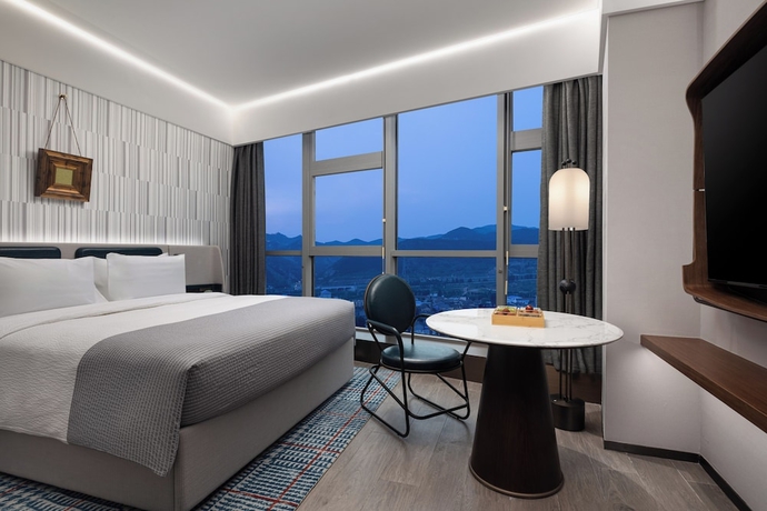 Imagen de la habitación del Hotel Wanda Moments Zibo. Foto 9