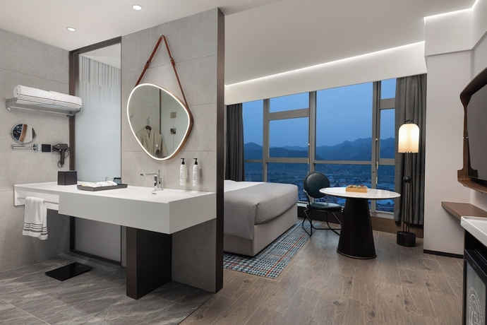 Imagen de la habitación del Hotel Wanda Moments Zibo. Foto 13