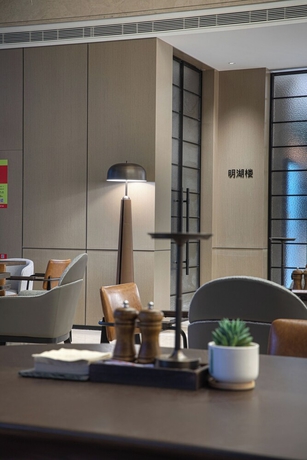 Imagen del bar/restaurante del Hotel Wanda Moments Zibo. Foto 3