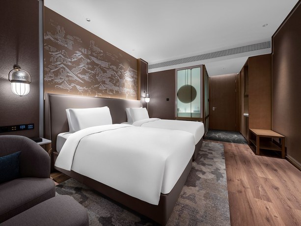 Imagen de la habitación del Hotel Wanda Realm Chengde Jinbao. Foto 11