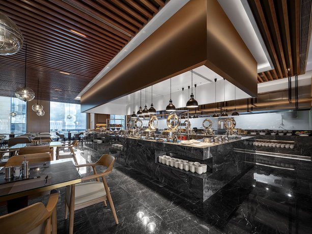 Imagen del bar/restaurante del Hotel Wanda Realm Chengde Jinbao. Foto 4