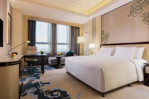 Imagen de la habitación del Hotel Wanda Realm Chifeng. Foto 10